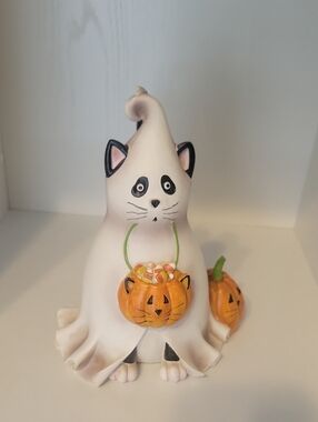 18" resin cat dressed in a ghost costume holding a treat basket with pumpkin